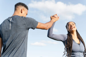 Two people doing a high five